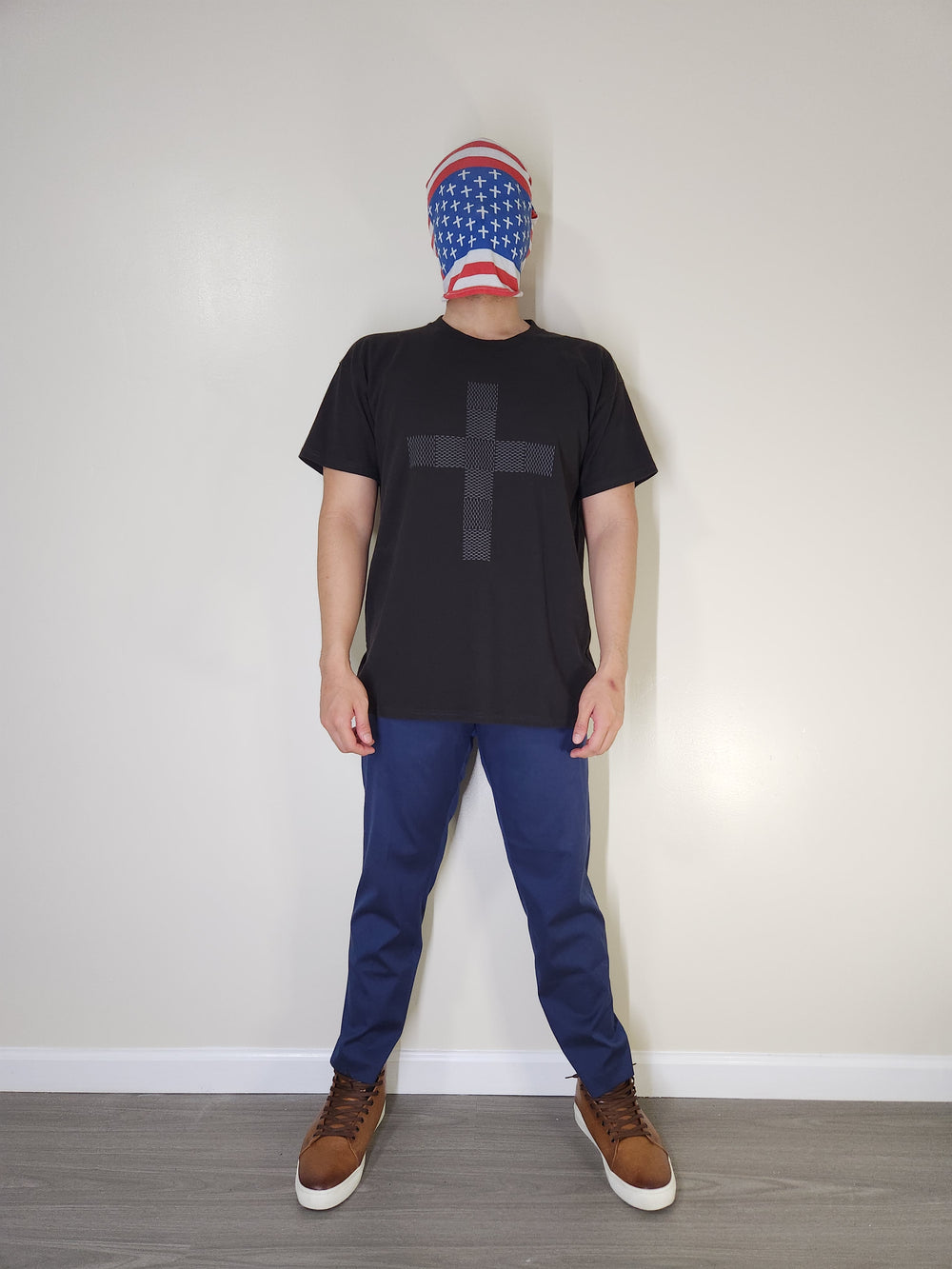 Model wearing The Gecko Protestant Cross black T-shirt, front view