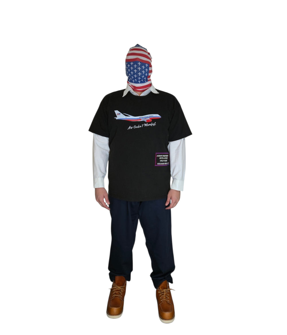 Model wearing black Air Gecko 7 Manifest T-shirt, full front view