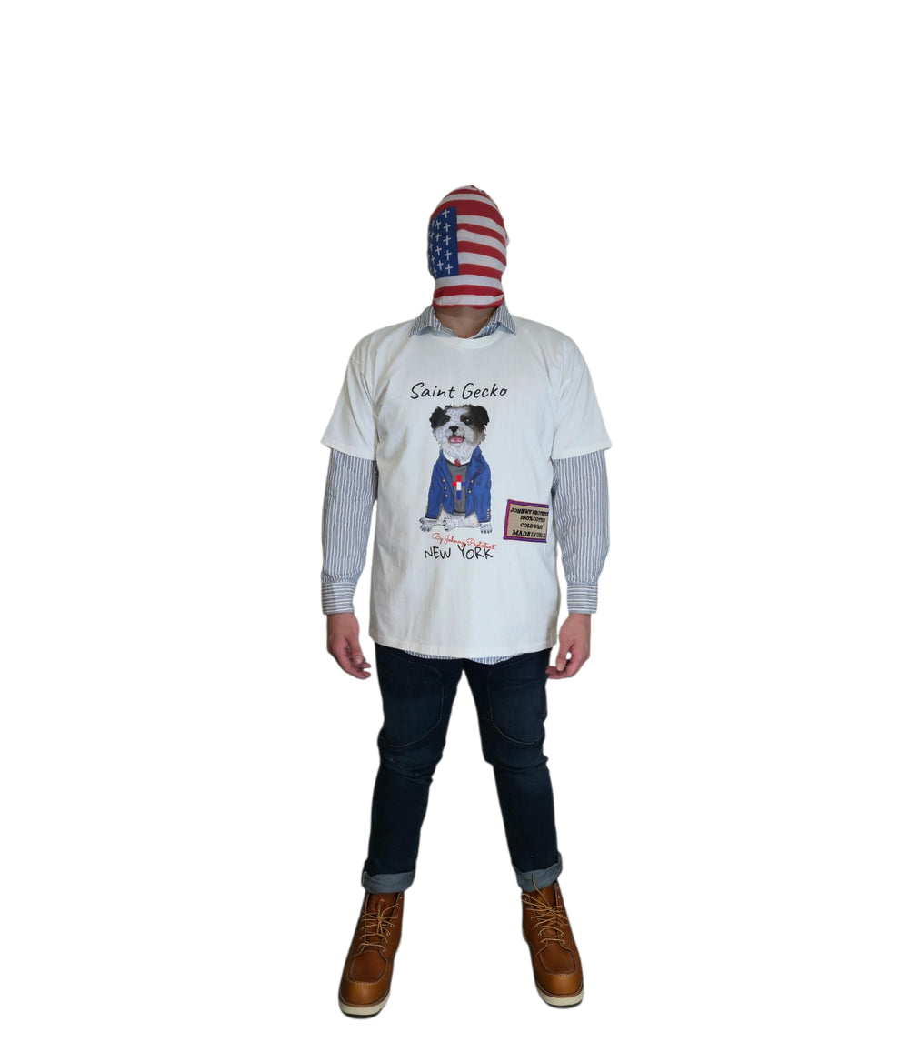 Model wearing Saint Gecko T-shirt over a striped shirt, dark jeans, and brown boots, front view