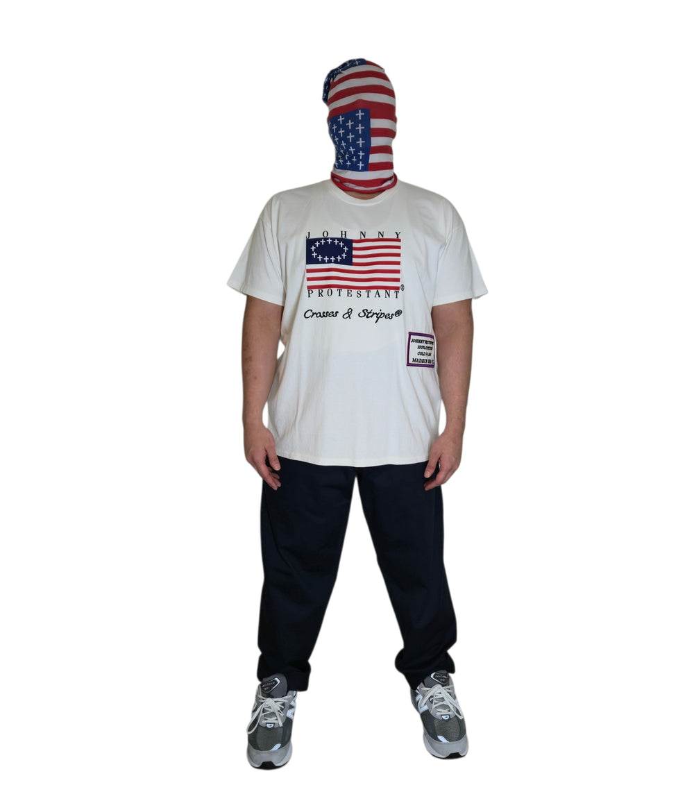 Model wearing ivory Betsy Protestant Flag T-shirt, full front view