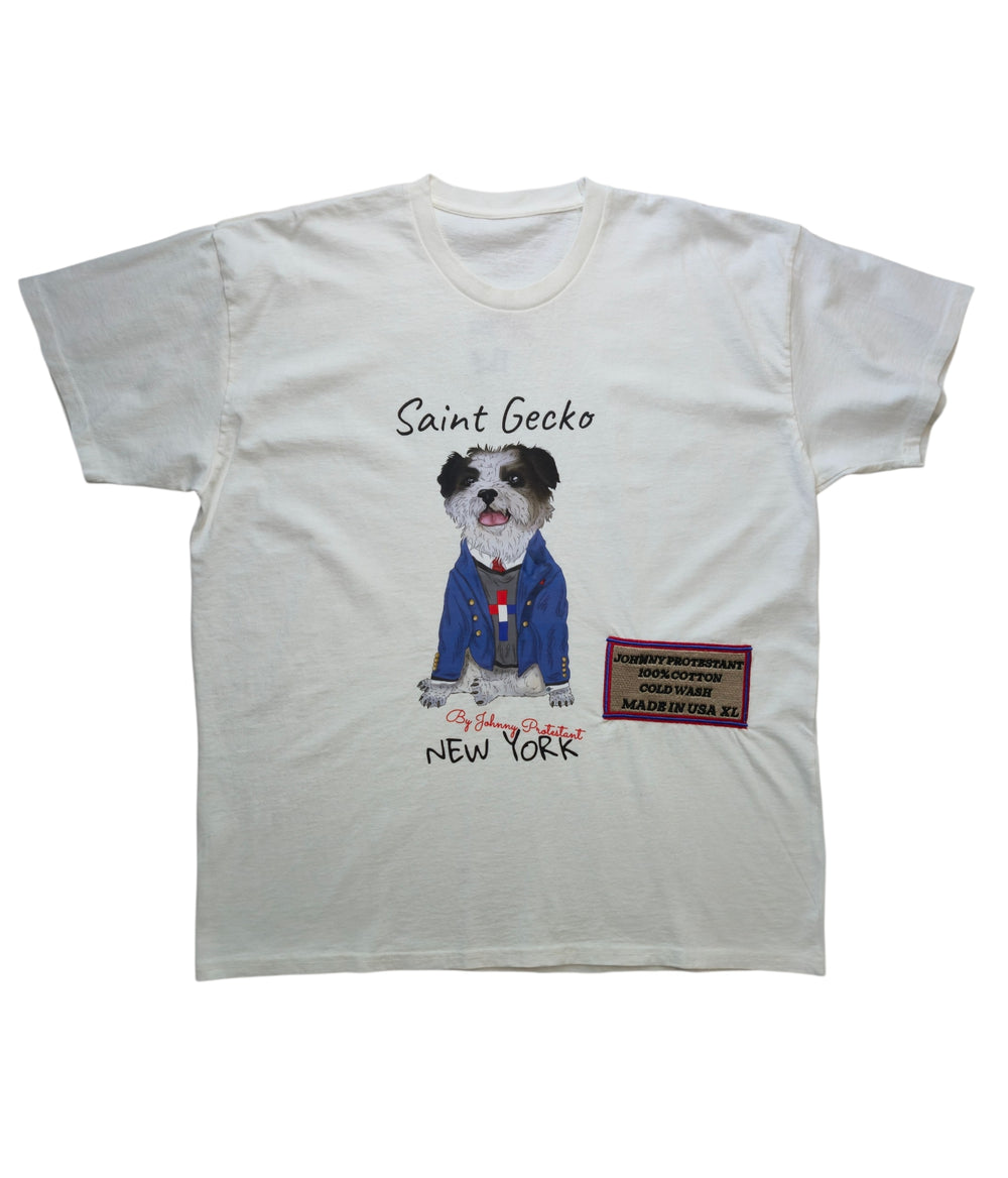 White Saint Gecko T-shirt front with illustrated dog in a blue jacket and woven side label