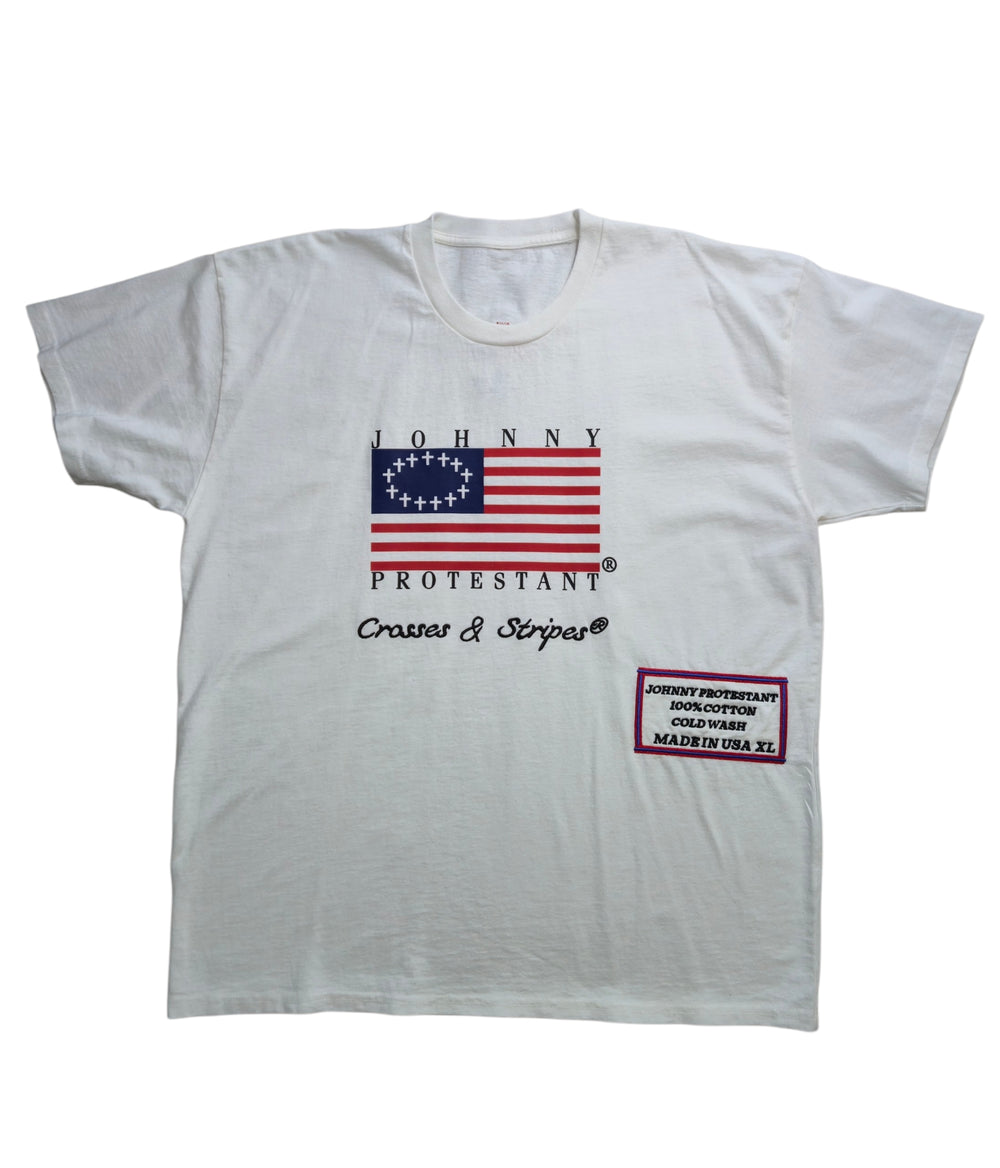 Ivory Betsy Protestant Flag T-shirt, front view with circular cross flag graphic and label